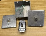 2 Hubbell Switches HBL7810D And Covers. Fixed Price $15.00.