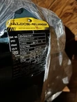 Baldor Reliance Brand Electric Motor New Never Used On Factory Plywood. Fixed Price $250.00.